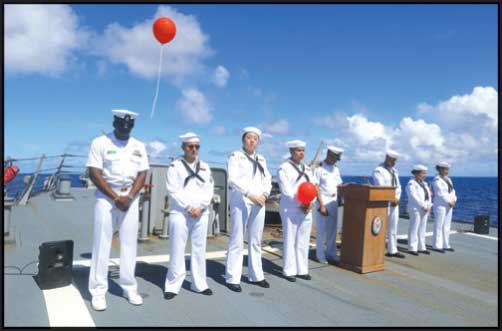 Seven Sailors, selected to represent the rates and ranks of the seven Sailors lost during a collision at sea five years ago, release balloons during a Remembrance Ceremony on USS Fitzgerald. US Navy photo by MC3 Catie Coyle