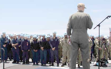 SAN DIEGO (May 25, 2023) Capt. Pete Riebe, commanding officer of the Nimitz-class aircraft carrier USS Abraham Lincoln (CVN 72), speaks to Sailors at an all-hands call on the flight deck. Abraham Lincoln is currently moored pierside at Naval Air Station North Island. U.S. Navy photo by MC3 Michael J Cintron