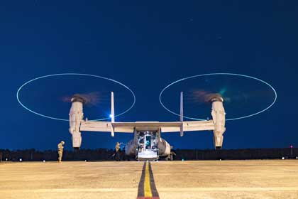 Predator's Run: Marines conduct a preflight inspection on an MV-22B Osprey during Predator's Run at Royal Australian Air Force Base Darwin, Northern Territory, Australia, July 24, 2024. Predator's Run is a littoral-focused, multilateral training exercise. USMC photo by Sgt. Cristian Bestul.