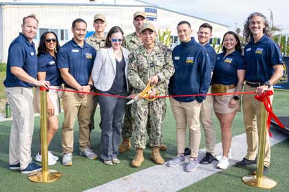 Navy Capt. Brian C. Bungay, Naval Base San Diego commanding officer, center, and base leadership are joined by Harborside Sports and Fitness Complex leaders during the grand opening of the Navy's first and only Human Performance Optimization Program, Feb. 2, 2026. The program is a comprehensive, performance-based initiative designed to enhance an individual's physical, mental, emotional and nutritional capabilities in order to maximize effectiveness, productivity and overall well-being. U.S. Navy photo by MC2 Aja Bleu Campbell
