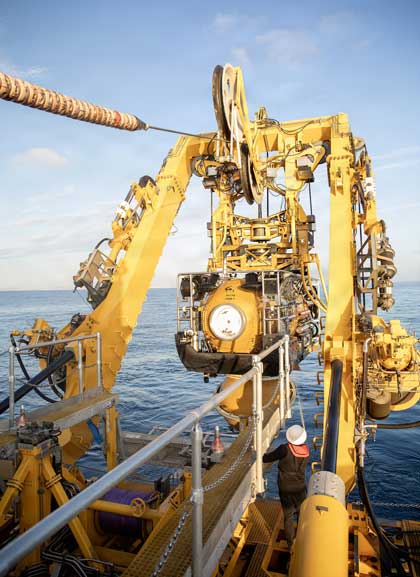 PACIFIC OCEAN (March 4, 2026) The specialized Launch and Recovery System (LARS) returns the pressurized rescue module (PRM-1) Falcon aboard Hornbeck Offshore Services (HOS) ship Mauser following the completion of a controlled manned dive evolution off the coast of San Diego, March 4, 2026. URC is composed of active duty and Reserve Component Sailors and operations and maintenance contractor located in San Diego, Calif., and is home to the U.S. Navy’s manned deep diving submarine rescue submersible. The team provides administrative, maintenance, operations, and logistics oversight for the Submarine Rescue Diving and Recompression System (SRDRS) and Sibitzky Remotely Operated Vehicle (ROV). U.S. Navy photo by MC1 Tiarra Brown.